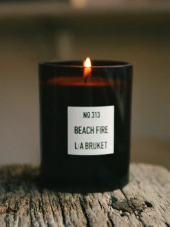 Candela profumata Beach Fire (legno di gaïac, legno affumicato)