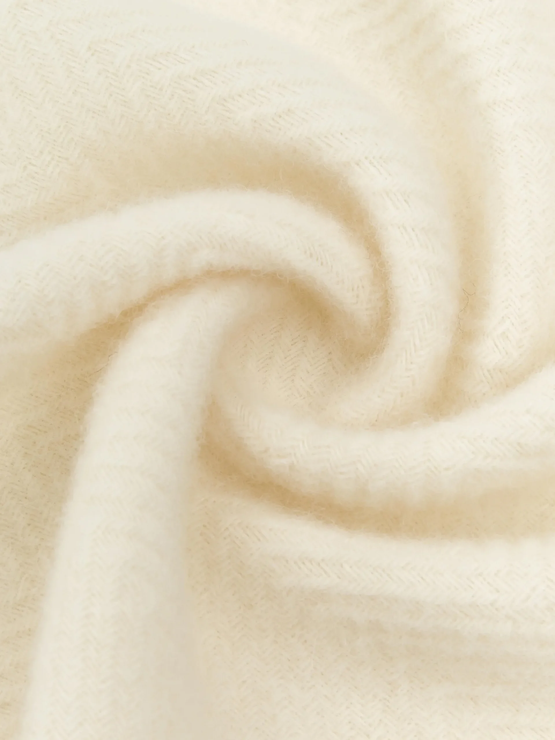 Coperta in lana con motivo a zig-zag e frange Tyrol