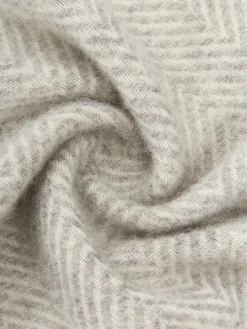 Coperta in lana con motivo a zig-zag e frange Tyrol