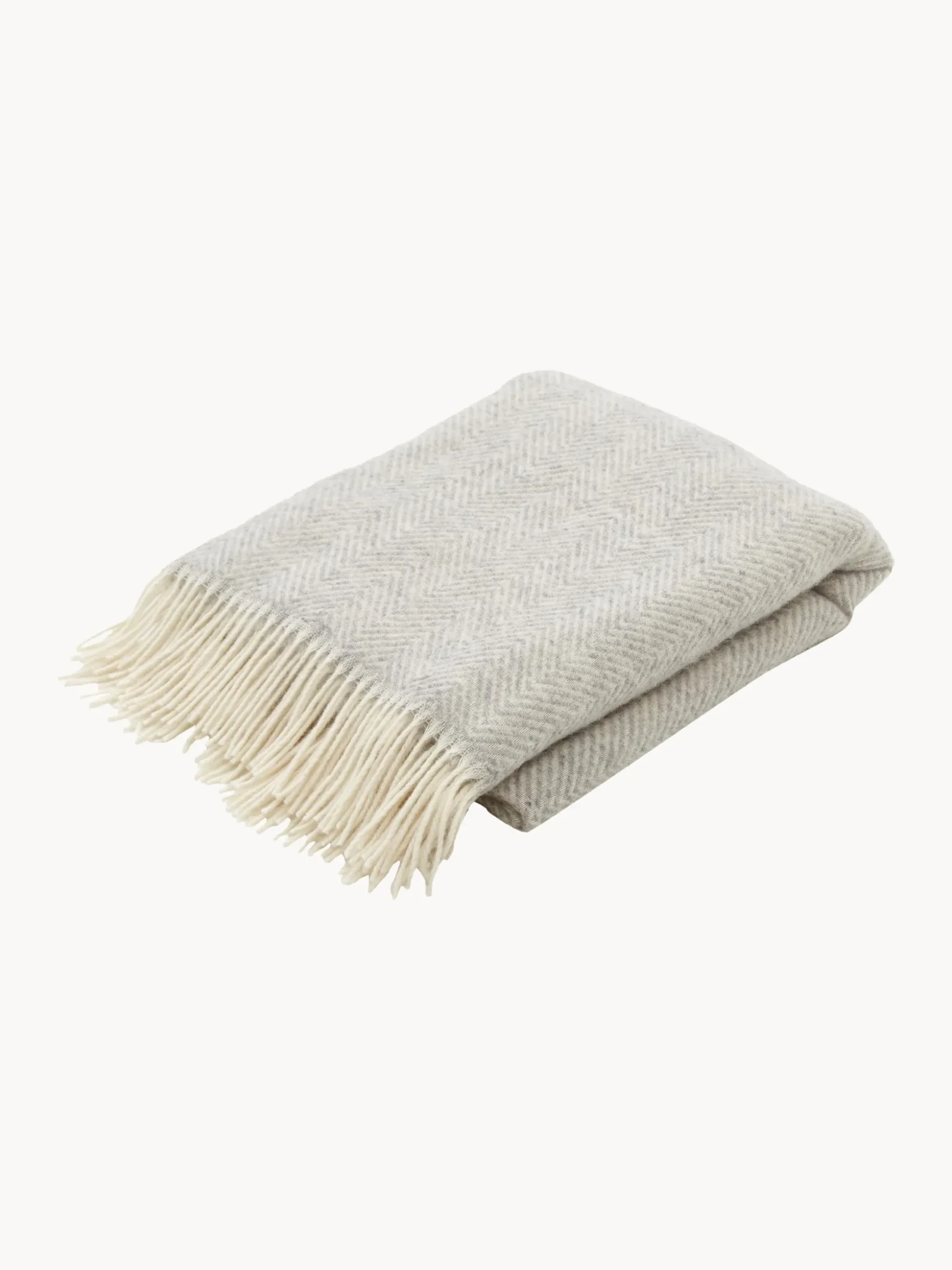 Coperta in lana con motivo a zig-zag e frange Tyrol