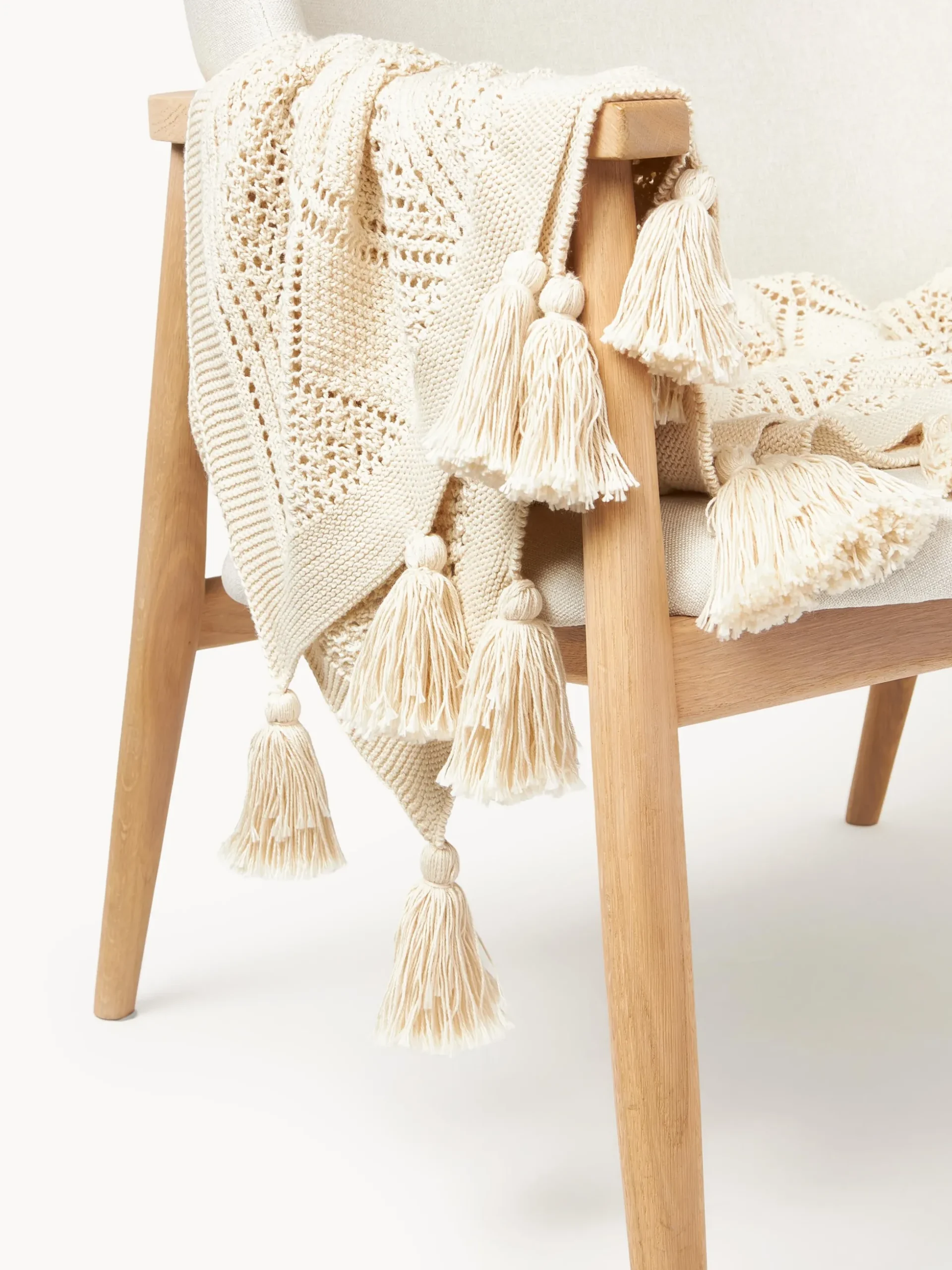 Coperta lavorata a maglia con nappe Sarah