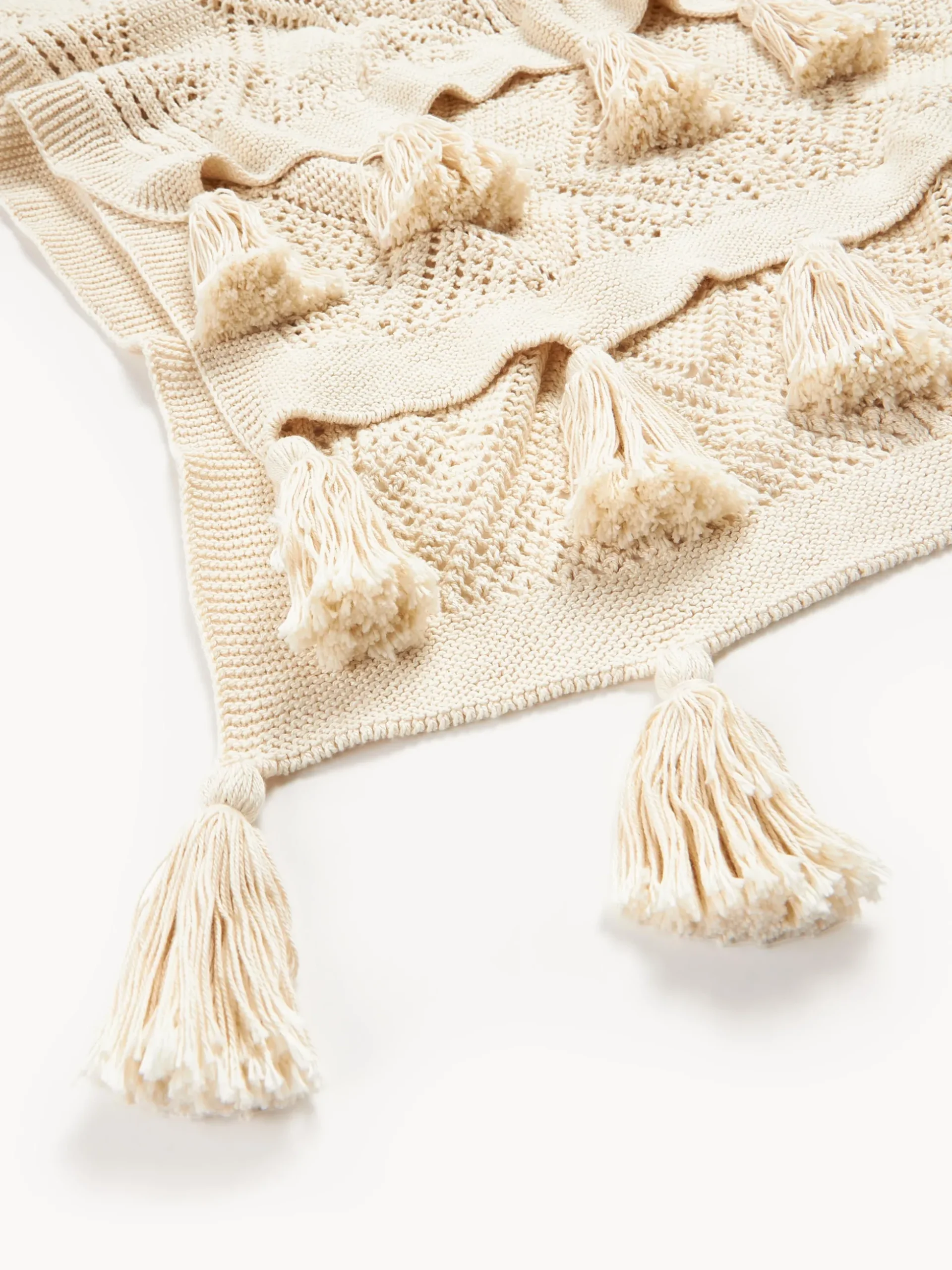 Coperta lavorata a maglia con nappe Sarah