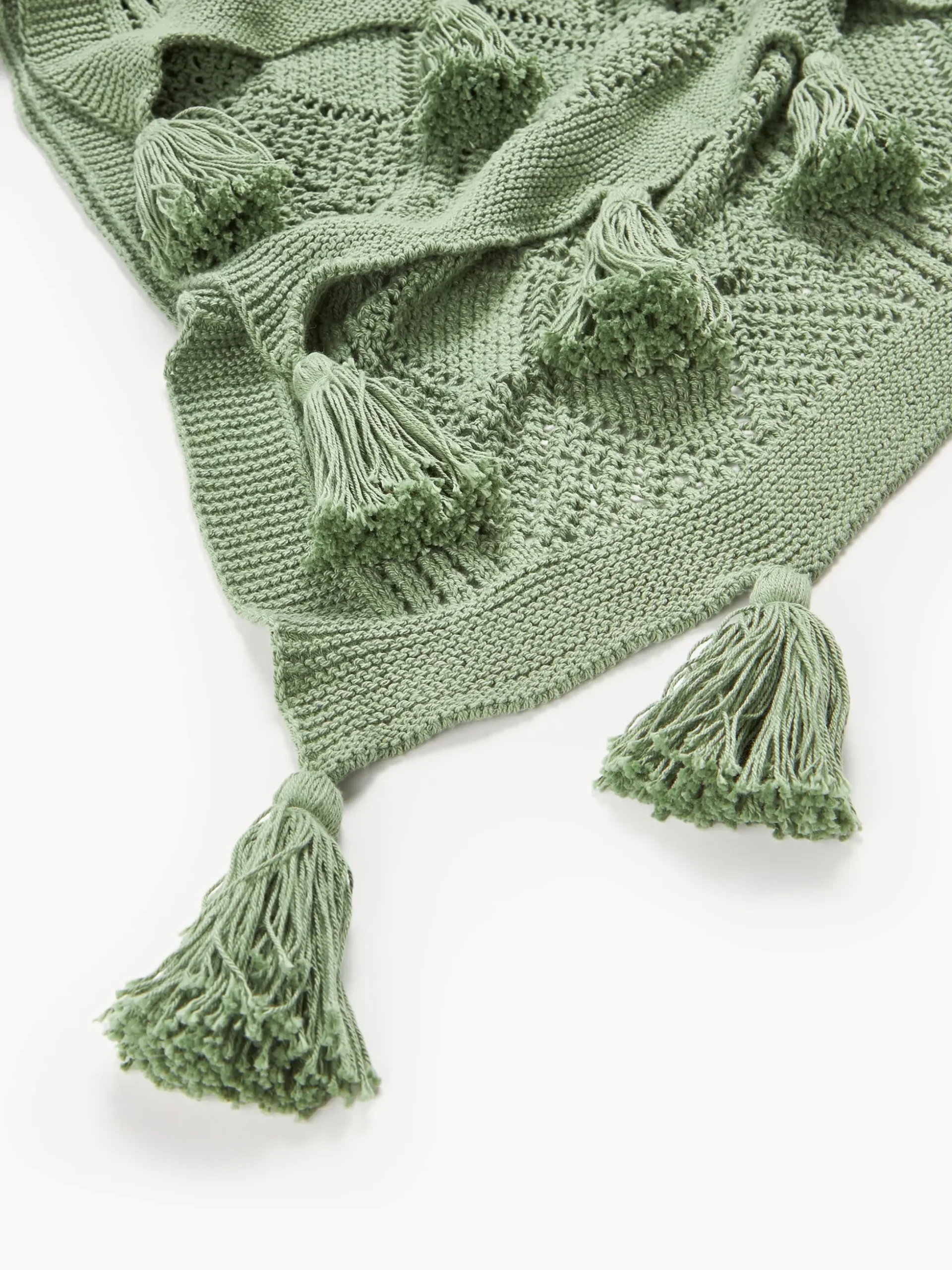 Coperta lavorata a maglia con nappe Sarah