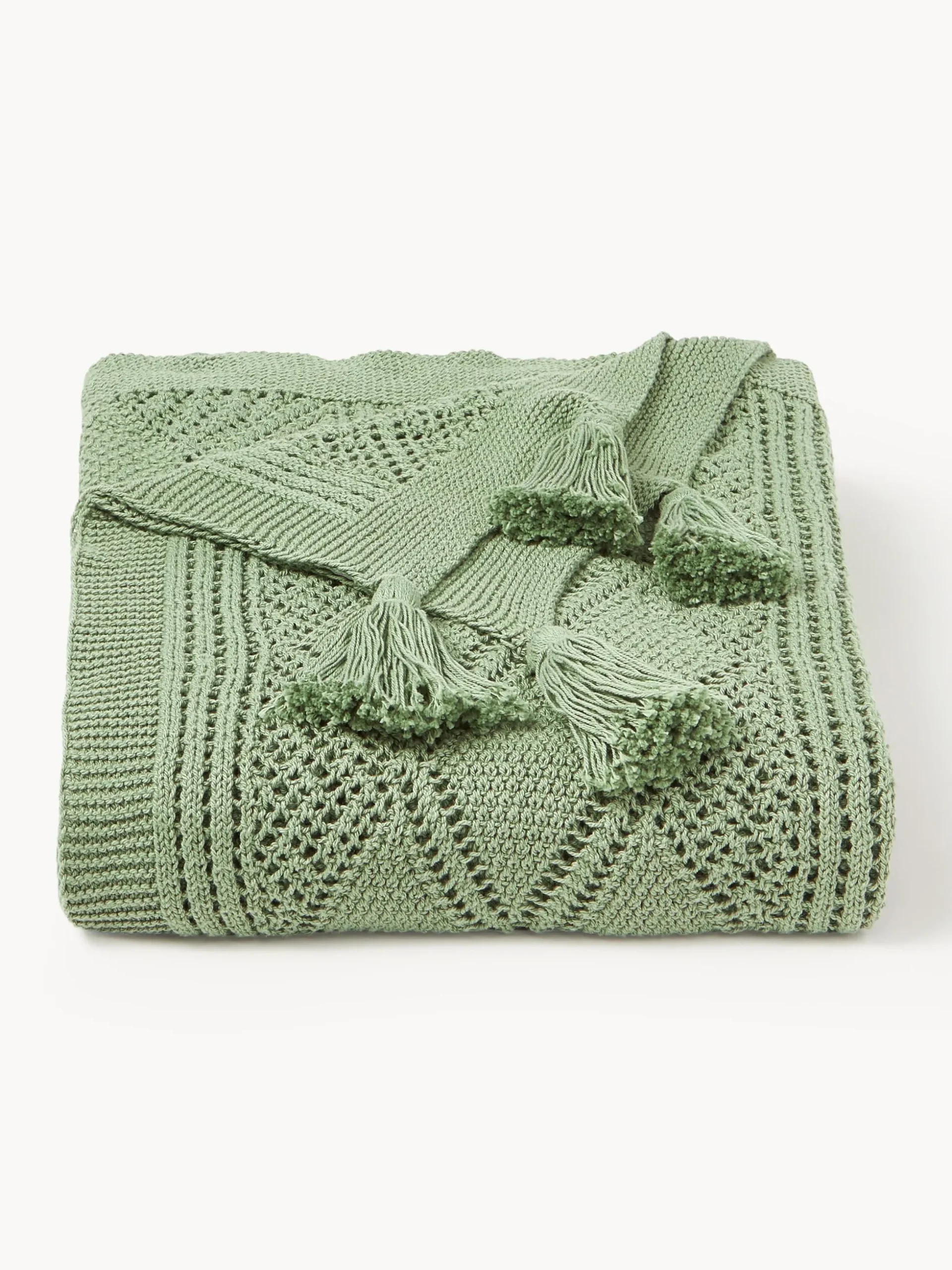 Coperta lavorata a maglia con nappe Sarah