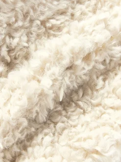 Copricuscino in teddy Dotty