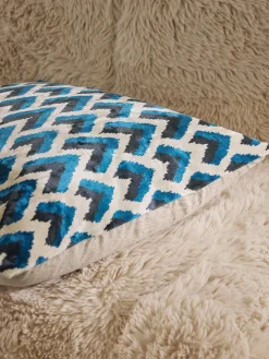 Copricuscino in viscosa con motivo jacquard tessuto Heron