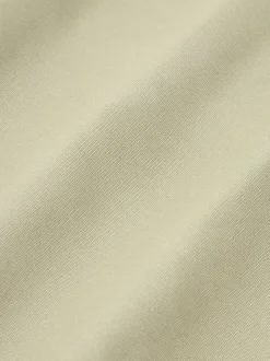 Copricuscino ricamato a mano in cotone organico Jot