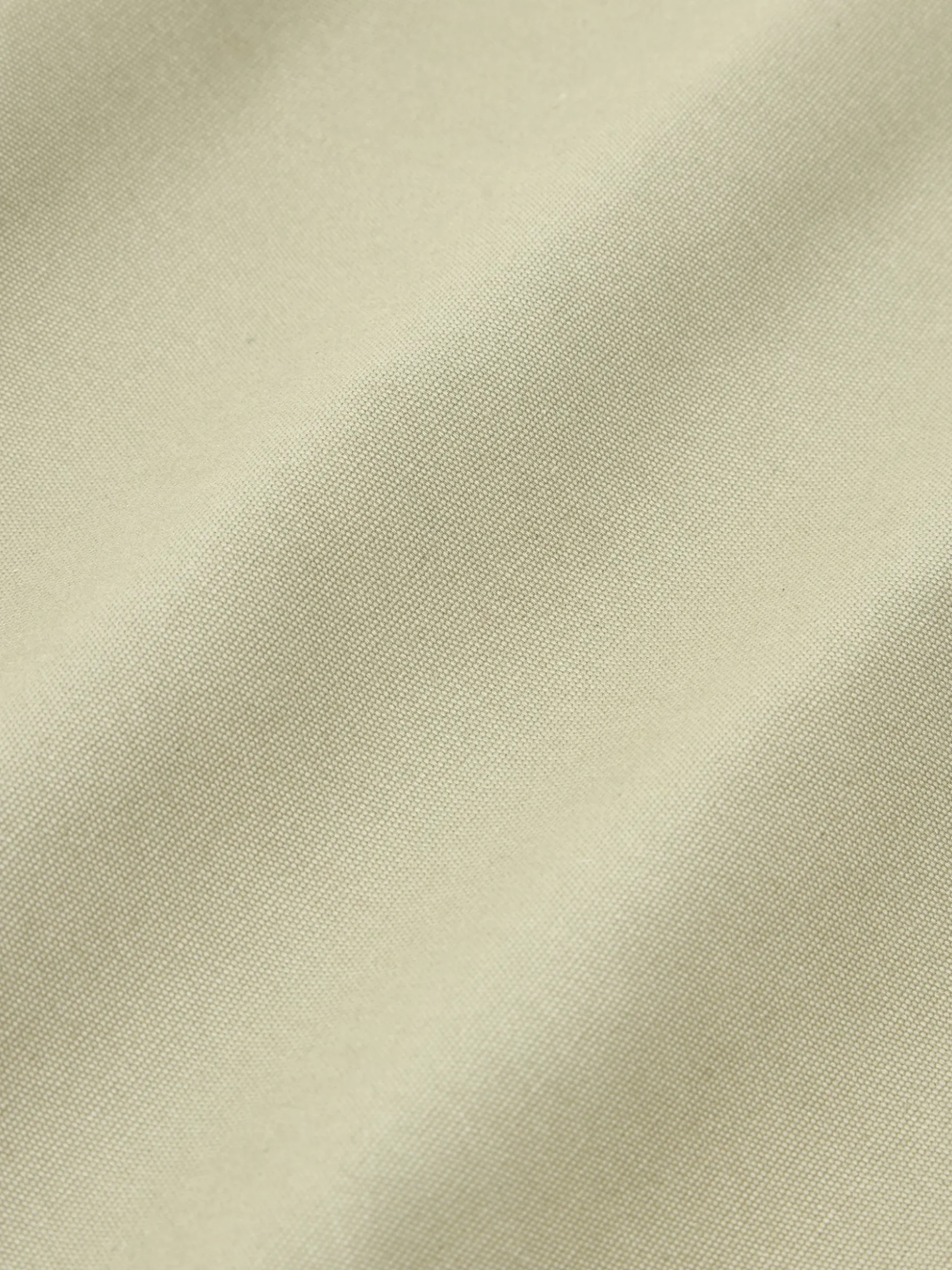 Copricuscino ricamato a mano in cotone organico Jot