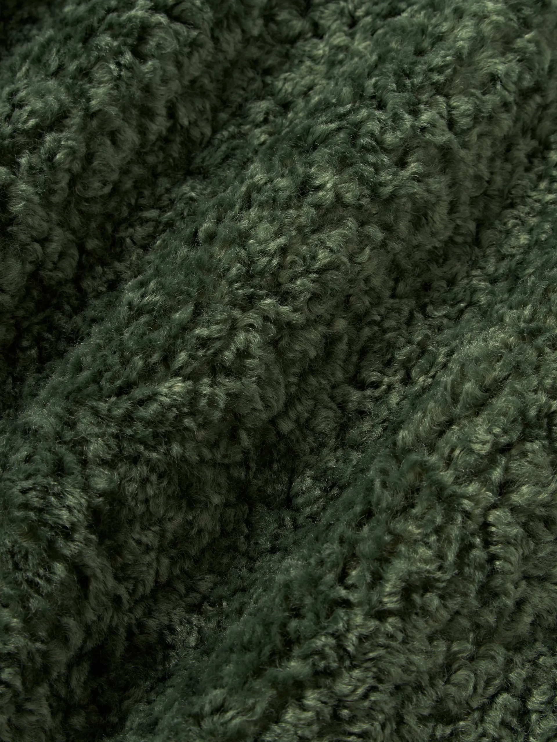 Copricuscino in teddy Dotty