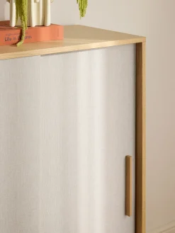 Credenza alta in legno con frontale imbottito Wisp