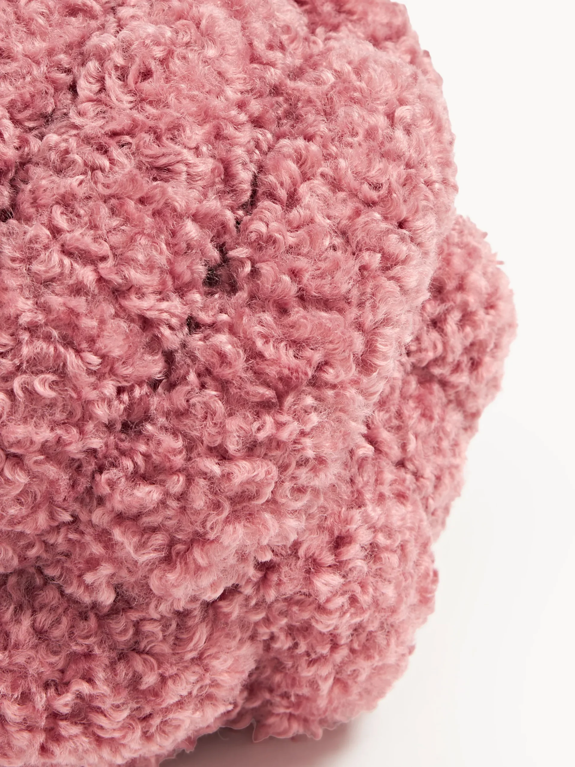 Cuscino annodato in teddy Dotty