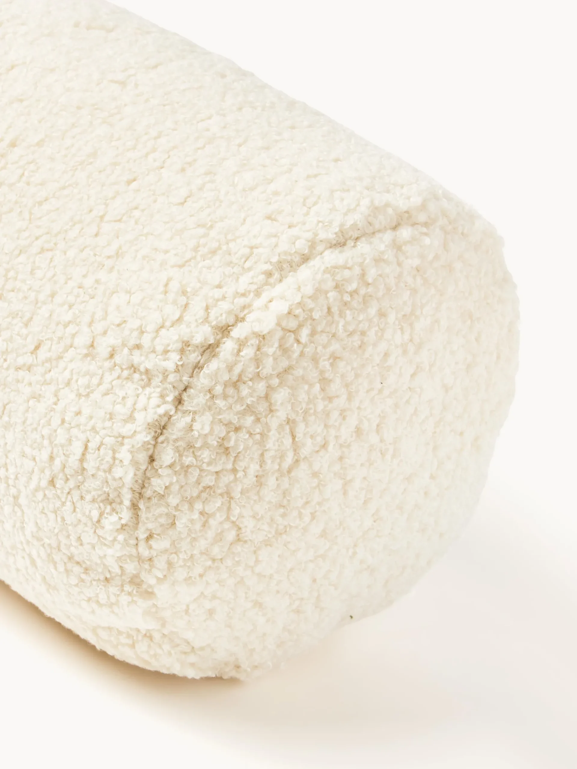 Cuscino cilindrico per divano in teddy Sofia