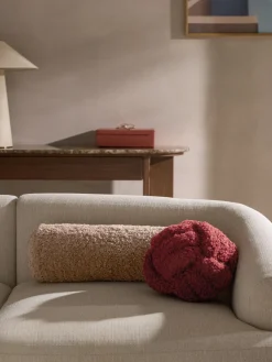 Cuscino cilindrico in teddy Dotty