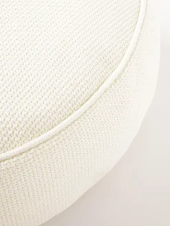 Cuscino decorativo rotondo in bouclé con bordino Aya