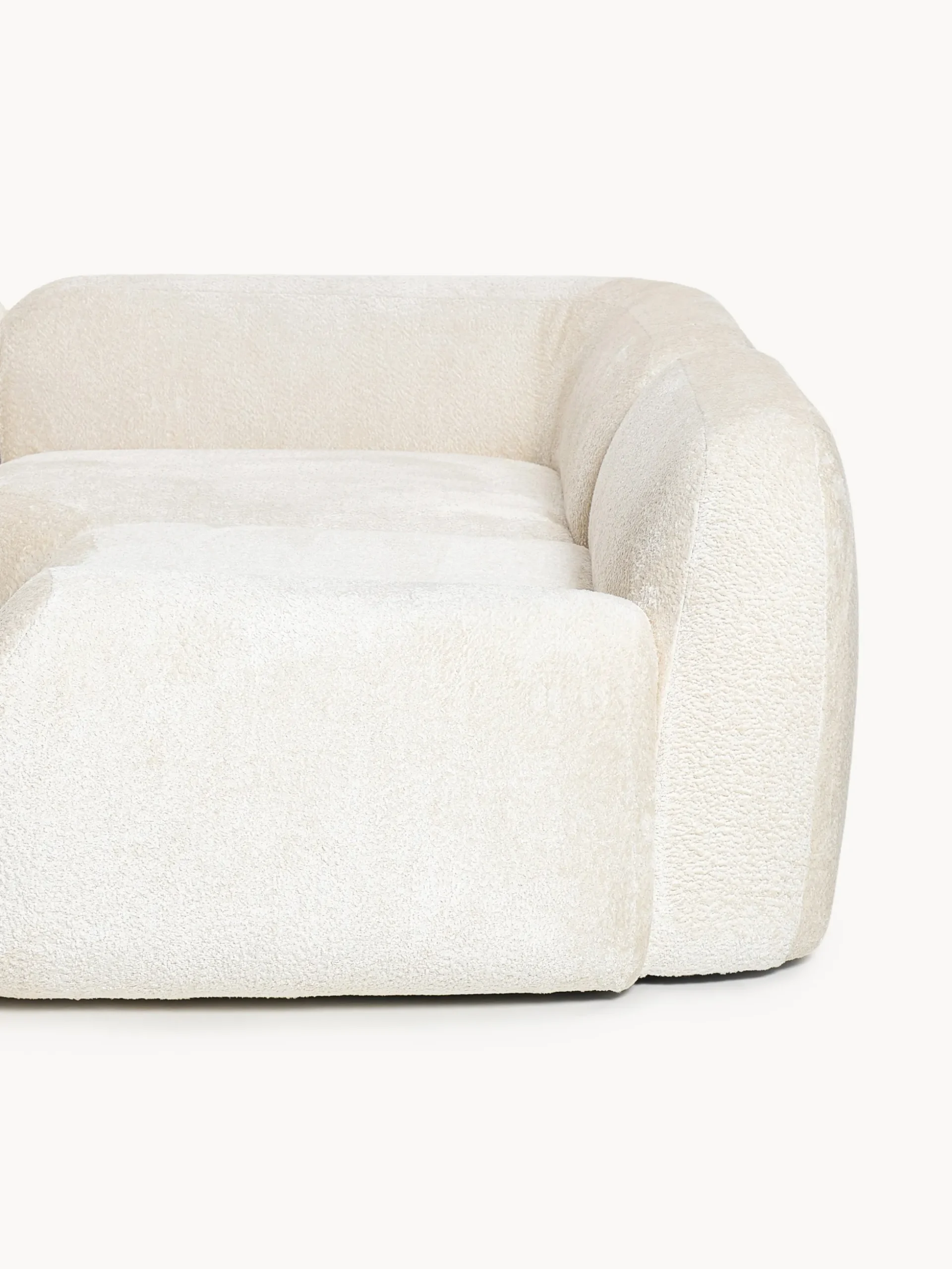 Divano angolare componibile 4 posti con chaise longue in teddy bouclé Wolke