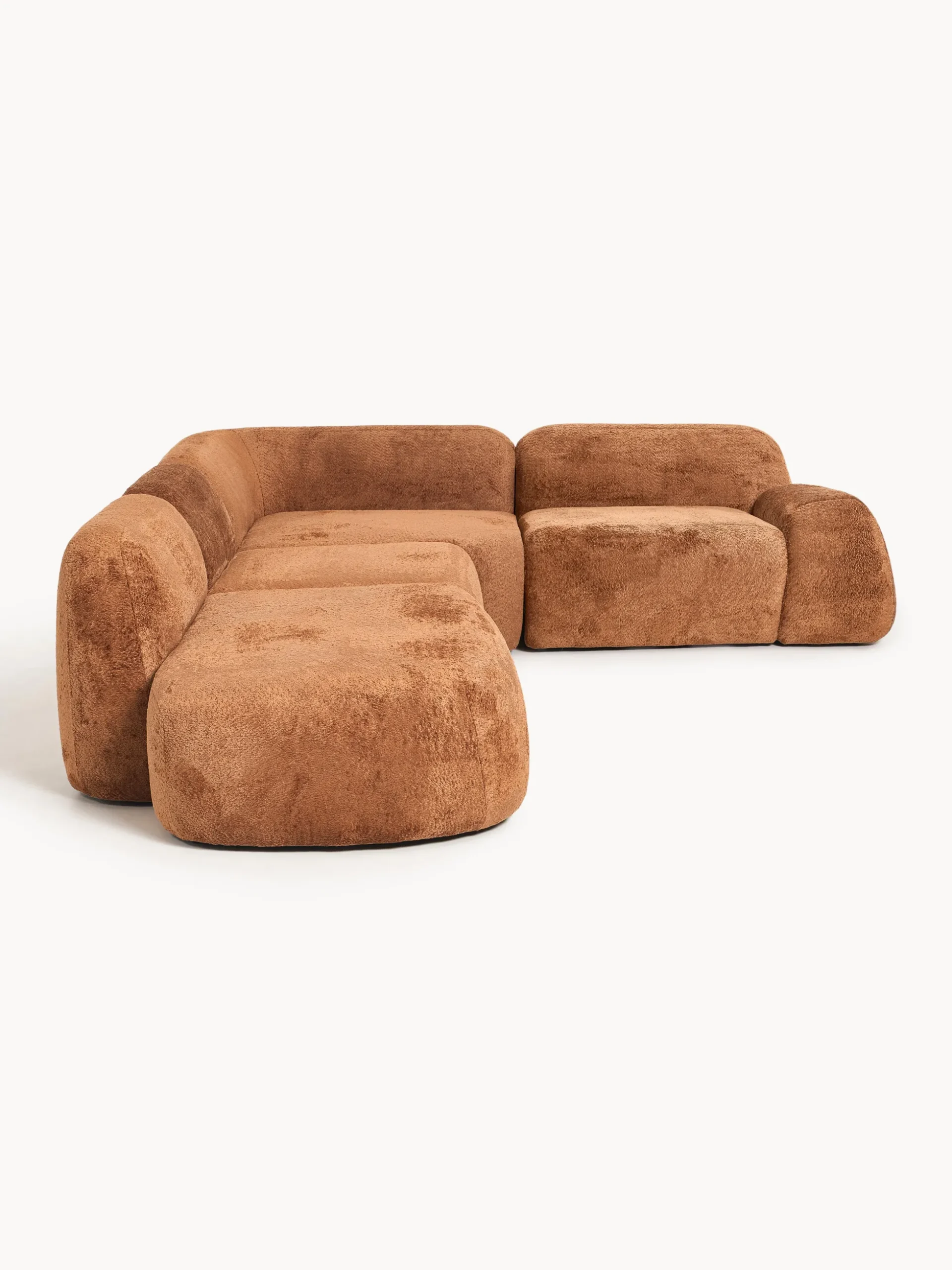 Divano angolare componibile 4 posti con chaise longue in teddy bouclé Wolke