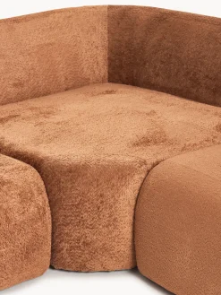 Divano angolare componibile 4 posti con chaise longue in teddy bouclé Wolke