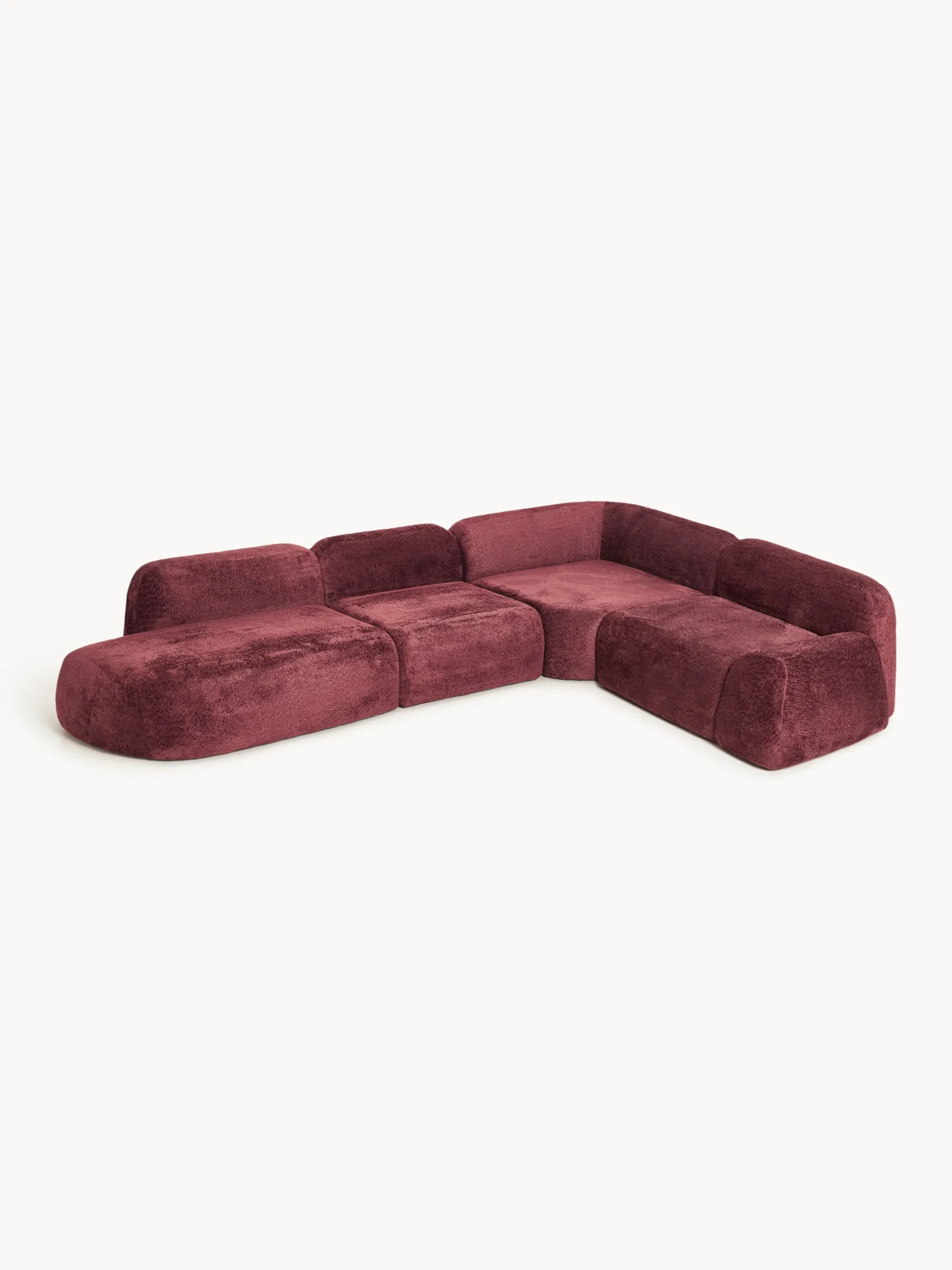 Divano angolare componibile 4 posti con chaise longue in teddy bouclé Wolke