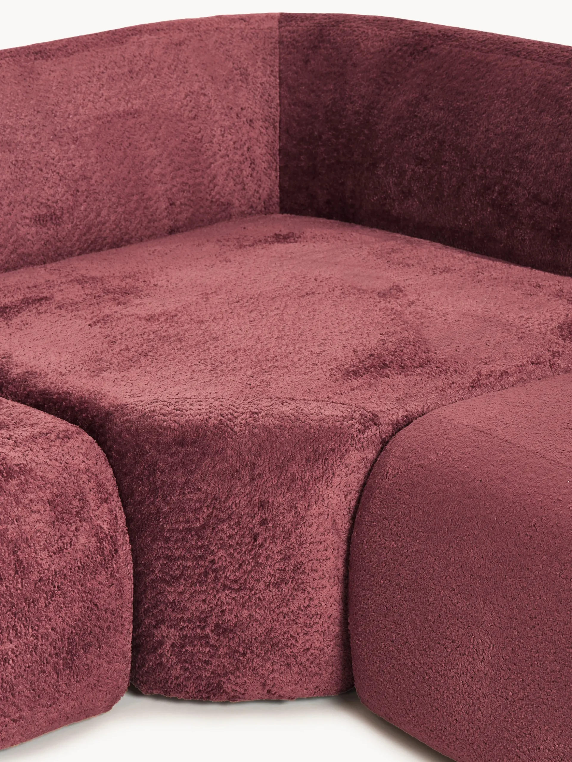 Divano angolare componibile 4 posti con chaise longue in teddy bouclé Wolke