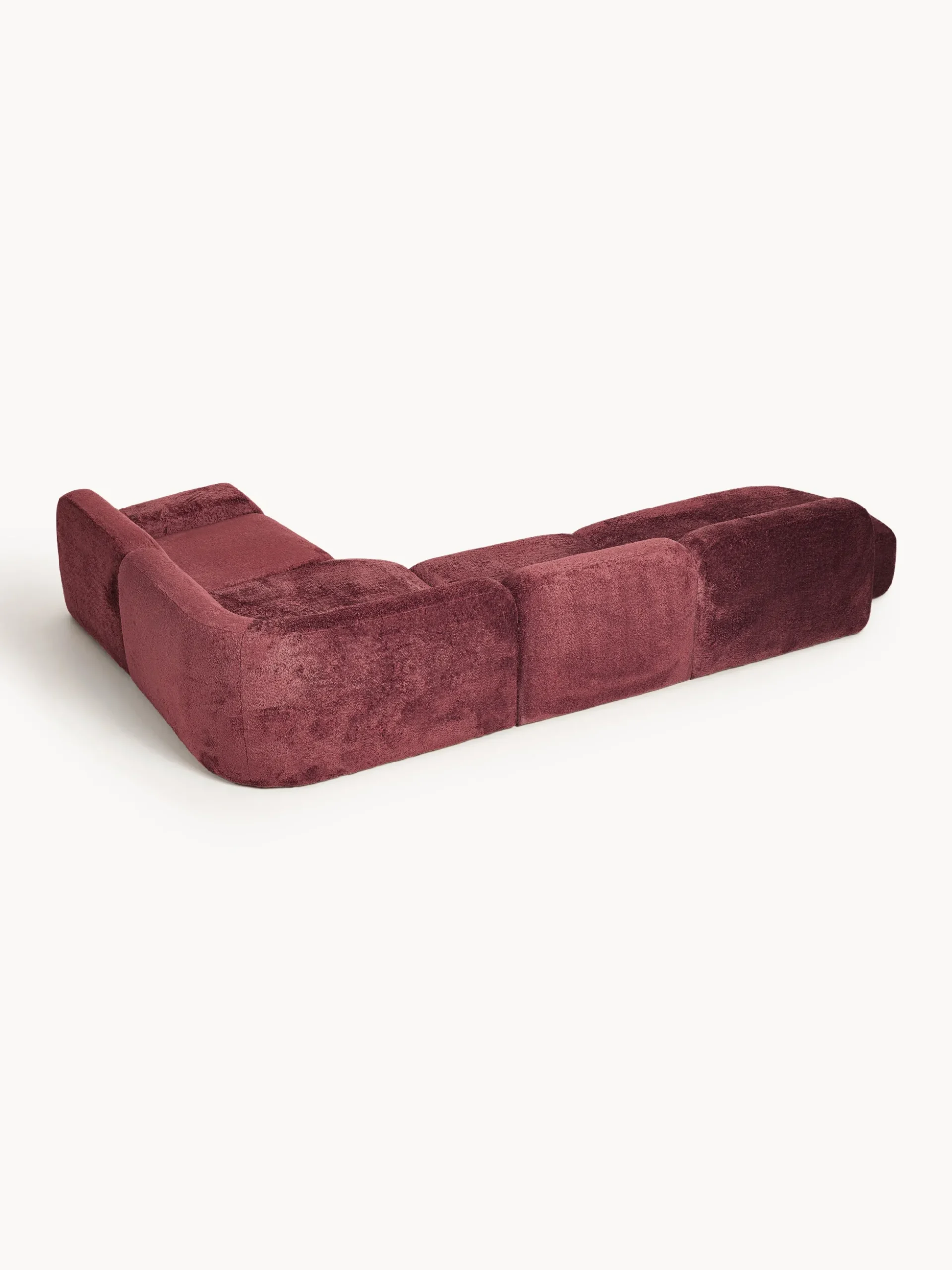 Divano angolare componibile 4 posti con chaise longue in teddy bouclé Wolke