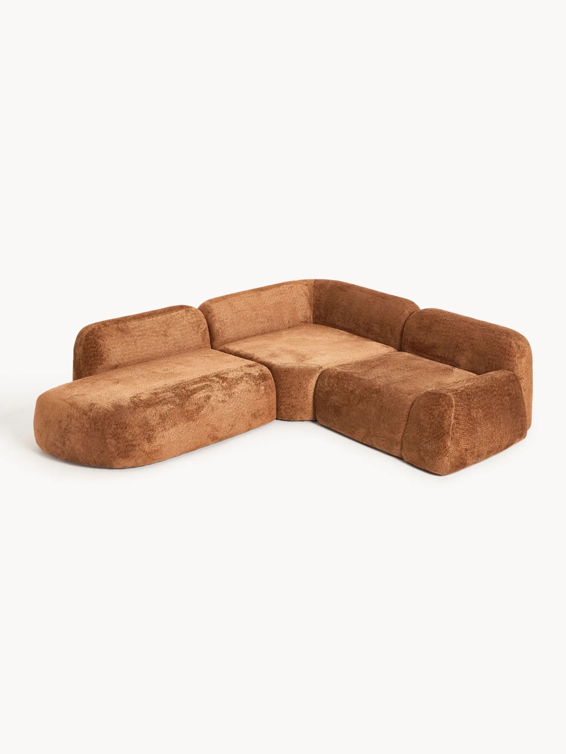 Divano angolare componibile 4 posti con chaise longue in teddy bouclé Wolke