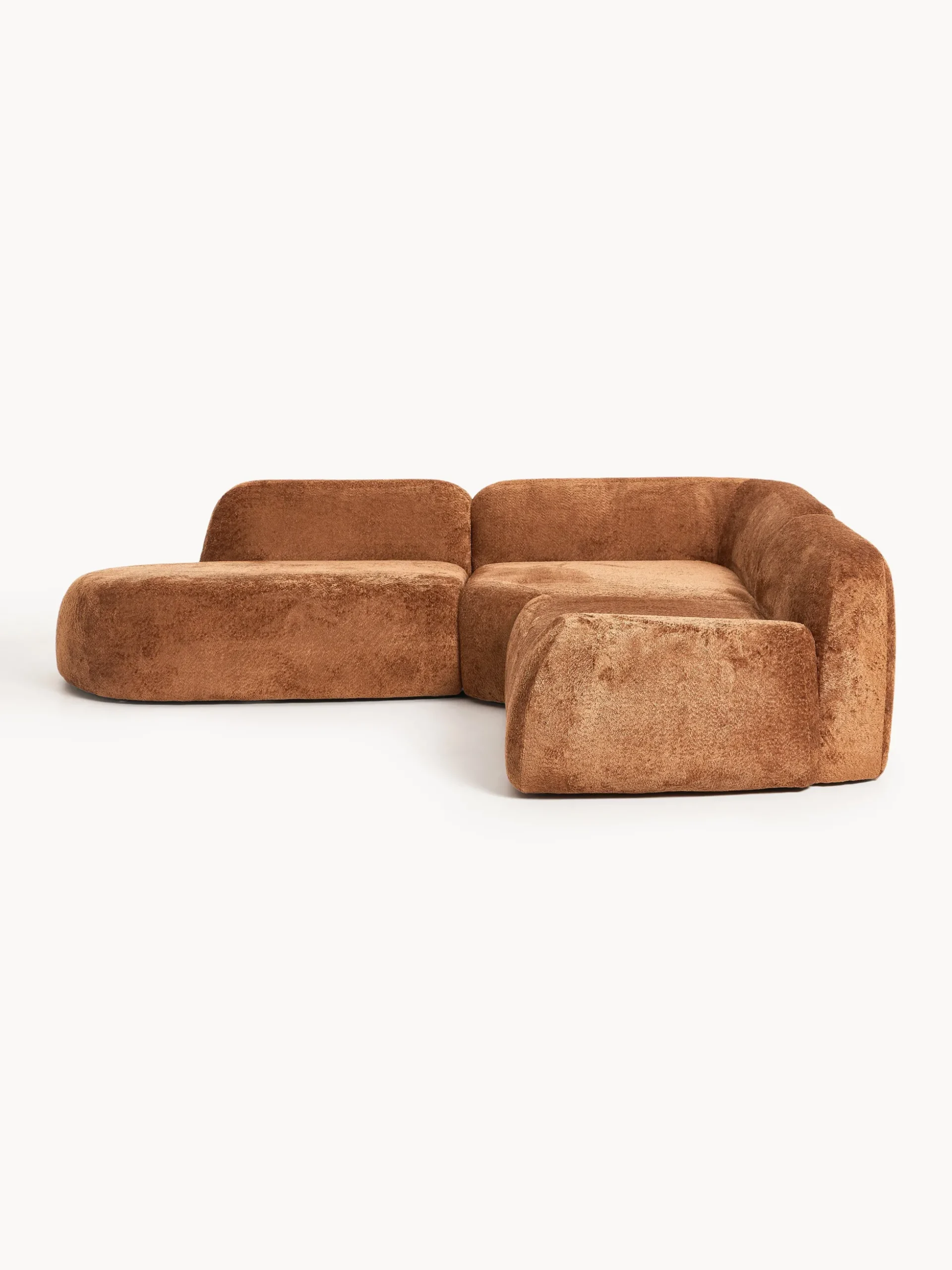 Divano angolare componibile 4 posti con chaise longue in teddy bouclé Wolke