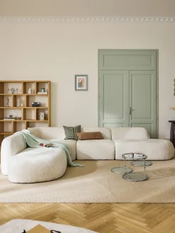 Divano angolare componibile 4 posti con chaise longue in teddy bouclé Wolke