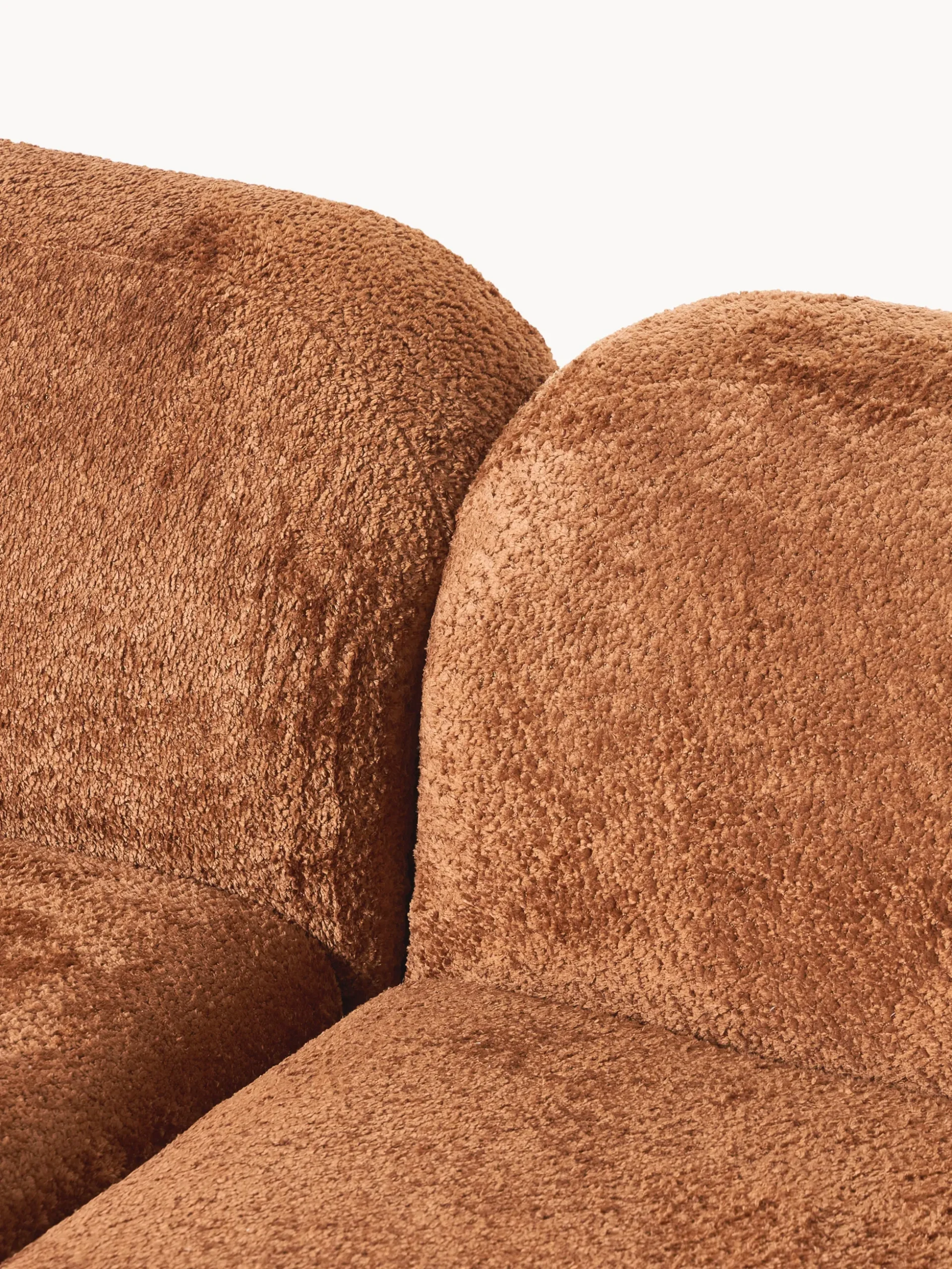 Divano angolare componibile 4 posti con chaise longue in teddy bouclé Wolke