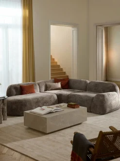 Divano angolare componibile 4 posti in teddy bouclé con chaise longue Wolke