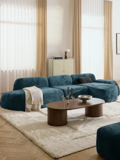 Divano angolare componibile 4 posti con chaise longue in teddy bouclé Wolke