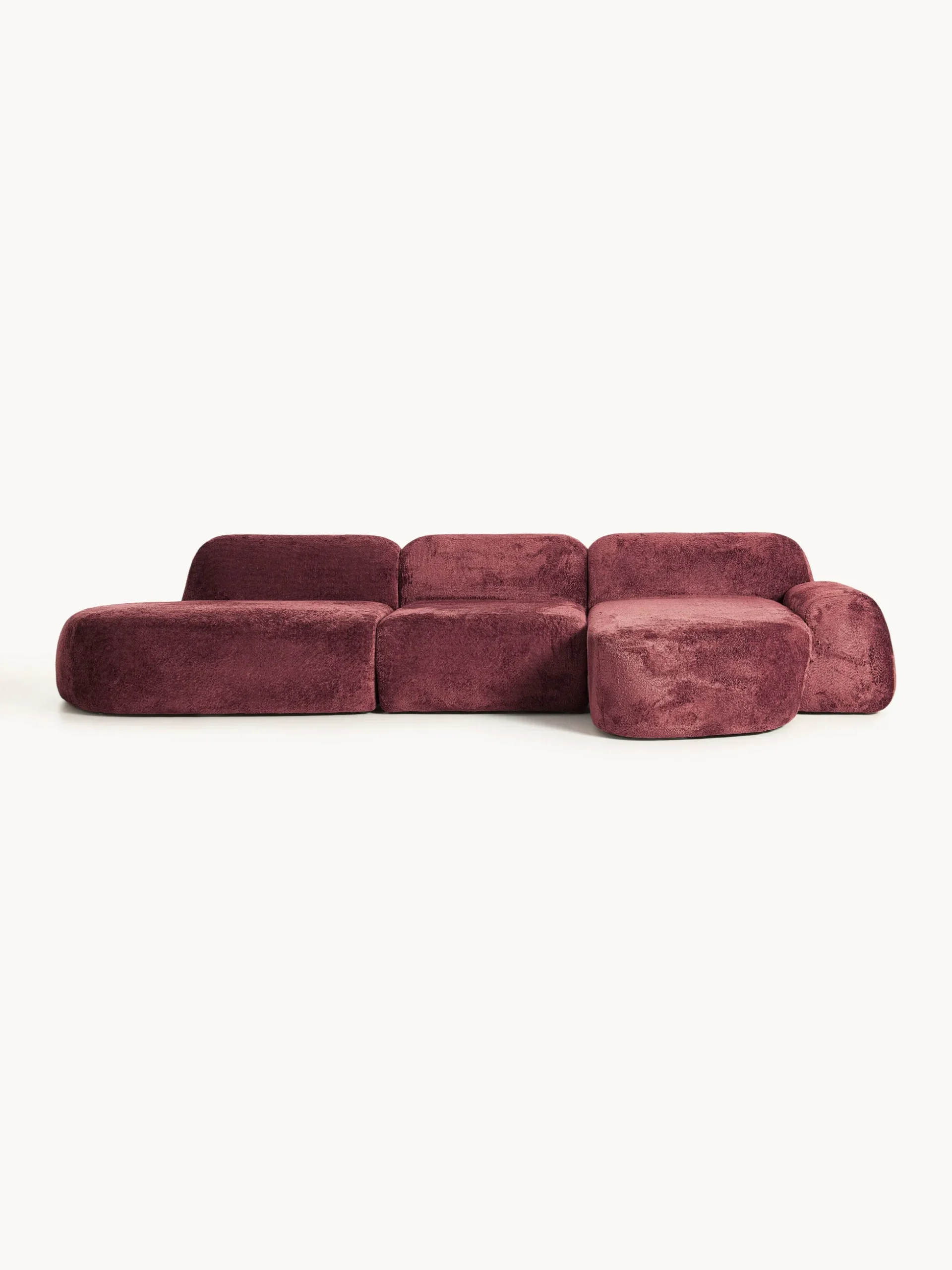 Divano angolare componibile 4 posti con chaise longue in teddy bouclé Wolke