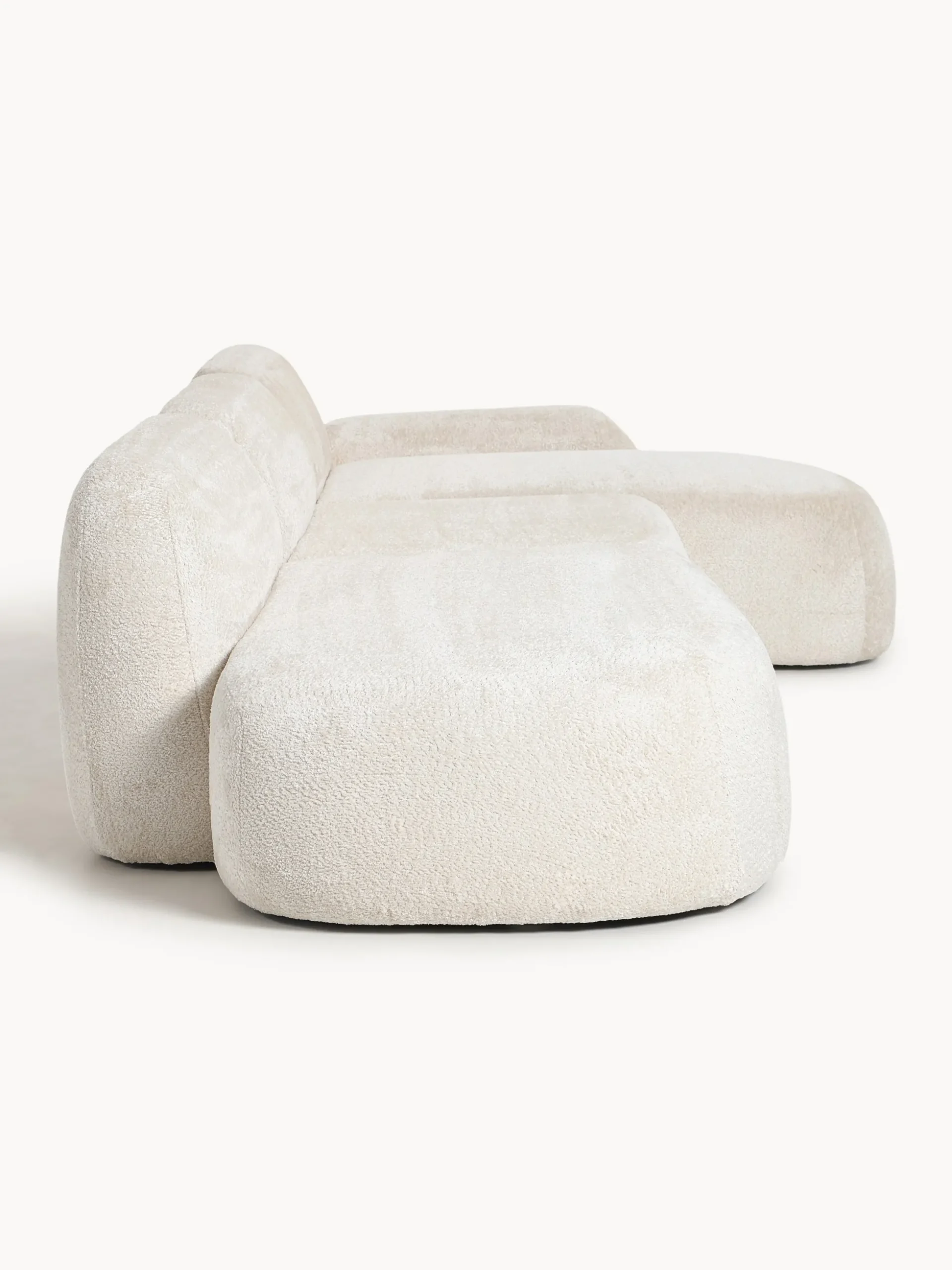 Divano angolare componibile 4 posti con chaise longue in teddy bouclé Wolke