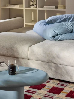 Divano letto 3 posti in bouclé con vano contenitore Tasha
