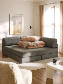 Divano letto angolare in bouclé con contenitore Ladina
