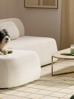 Divano letto angolare in teddy-bouclé con contenitore Pao