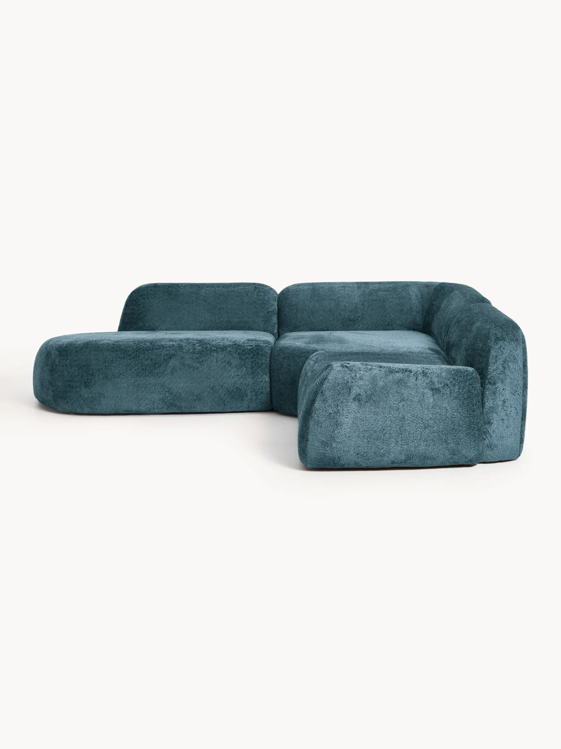 Divano angolare componibile 4 posti con chaise longue in teddy bouclé Wolke