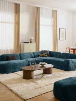 Divano angolare componibile 4 posti con chaise longue in teddy bouclé Wolke