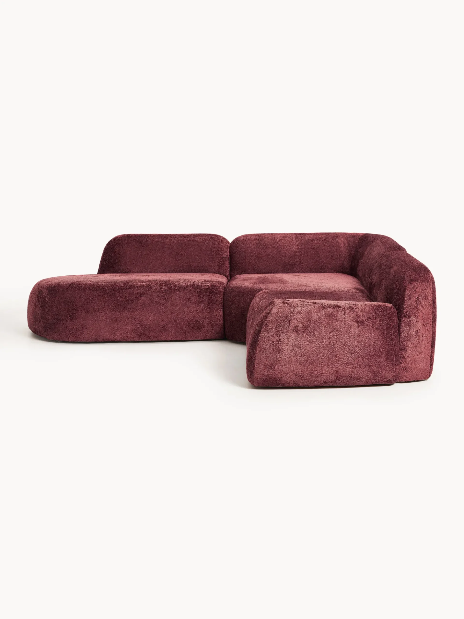 Divano angolare componibile 4 posti con chaise longue in teddy bouclé Wolke