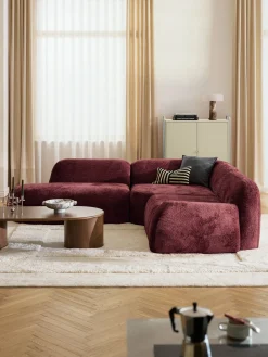 Divano angolare componibile 4 posti con chaise longue in teddy bouclé Wolke
