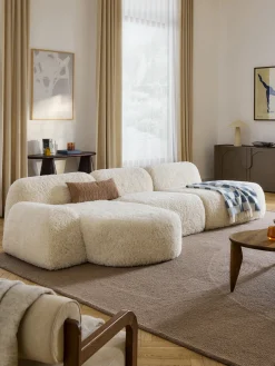 Divano angolare componibile 4 posti con chaise longue in teddy Wolke