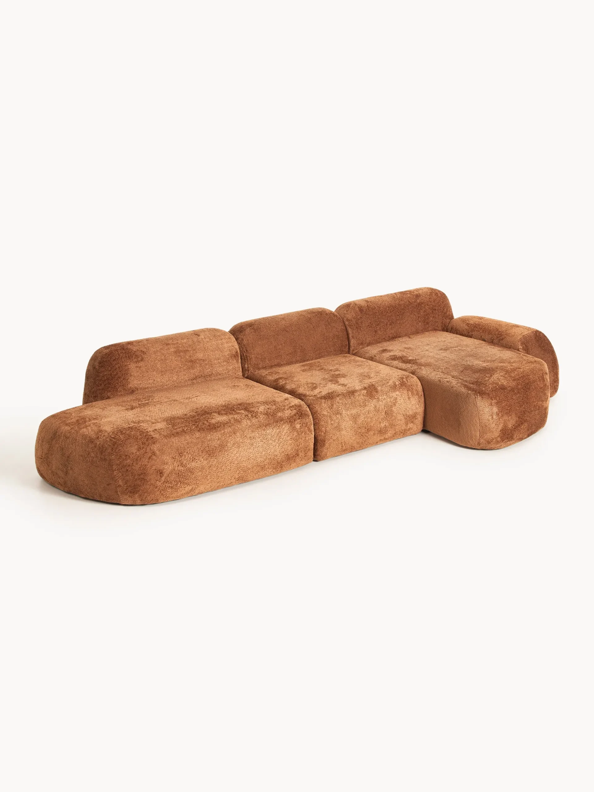 Divano angolare componibile 4 posti con chaise longue in teddy bouclé Wolke