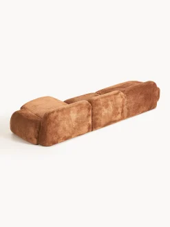 Divano angolare componibile 4 posti con chaise longue in teddy bouclé Wolke
