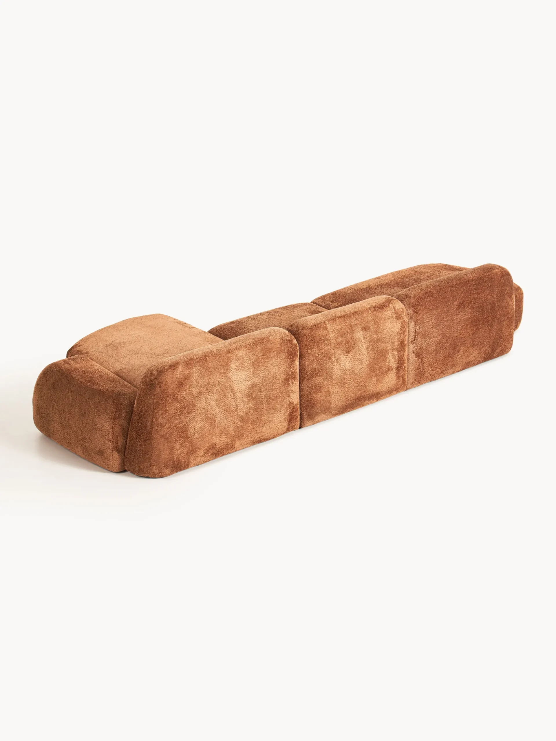 Divano angolare componibile 4 posti con chaise longue in teddy bouclé Wolke