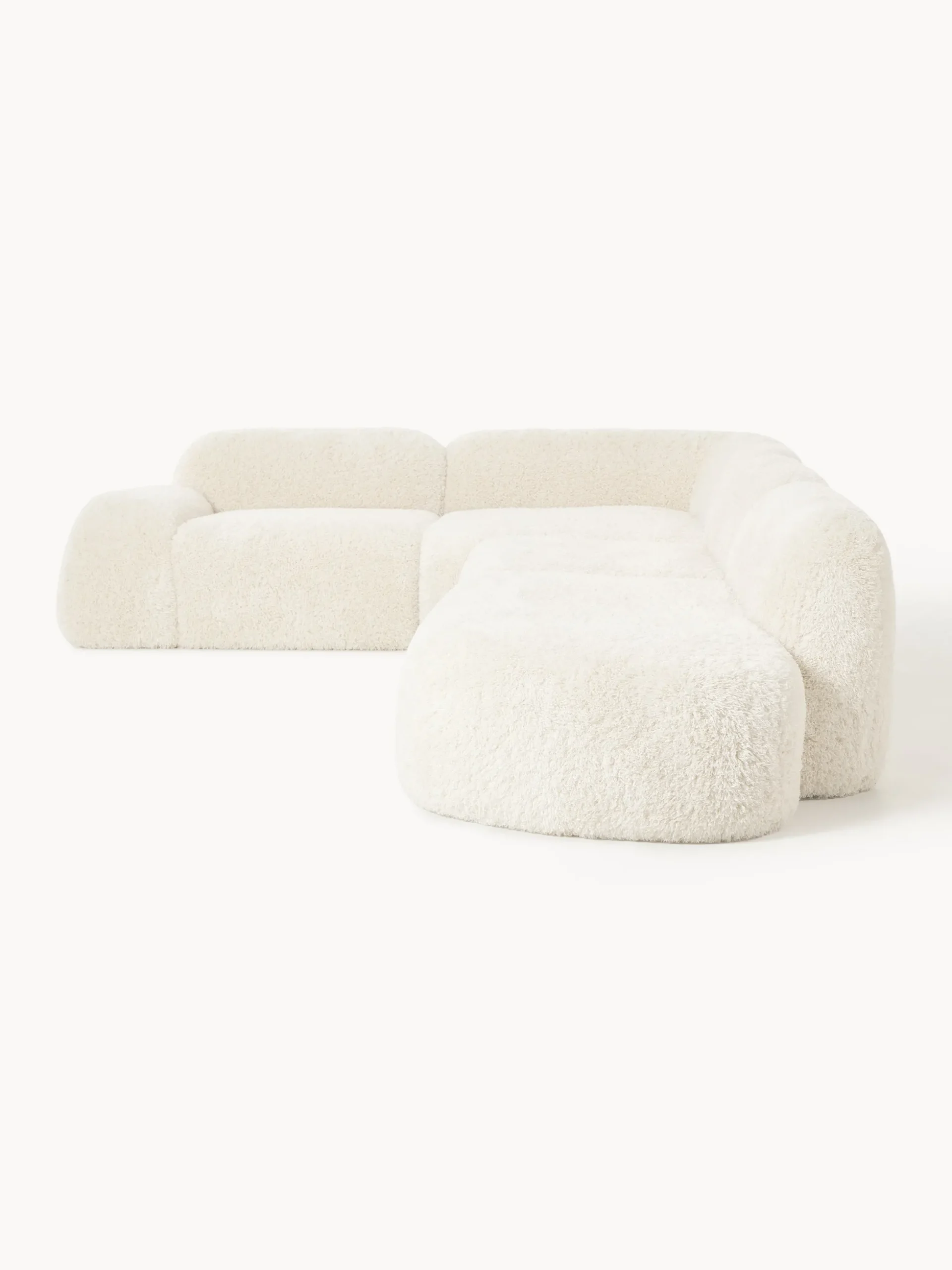 Divano angolare XL componibile 4 posti con chaise longue in teddy Wolke