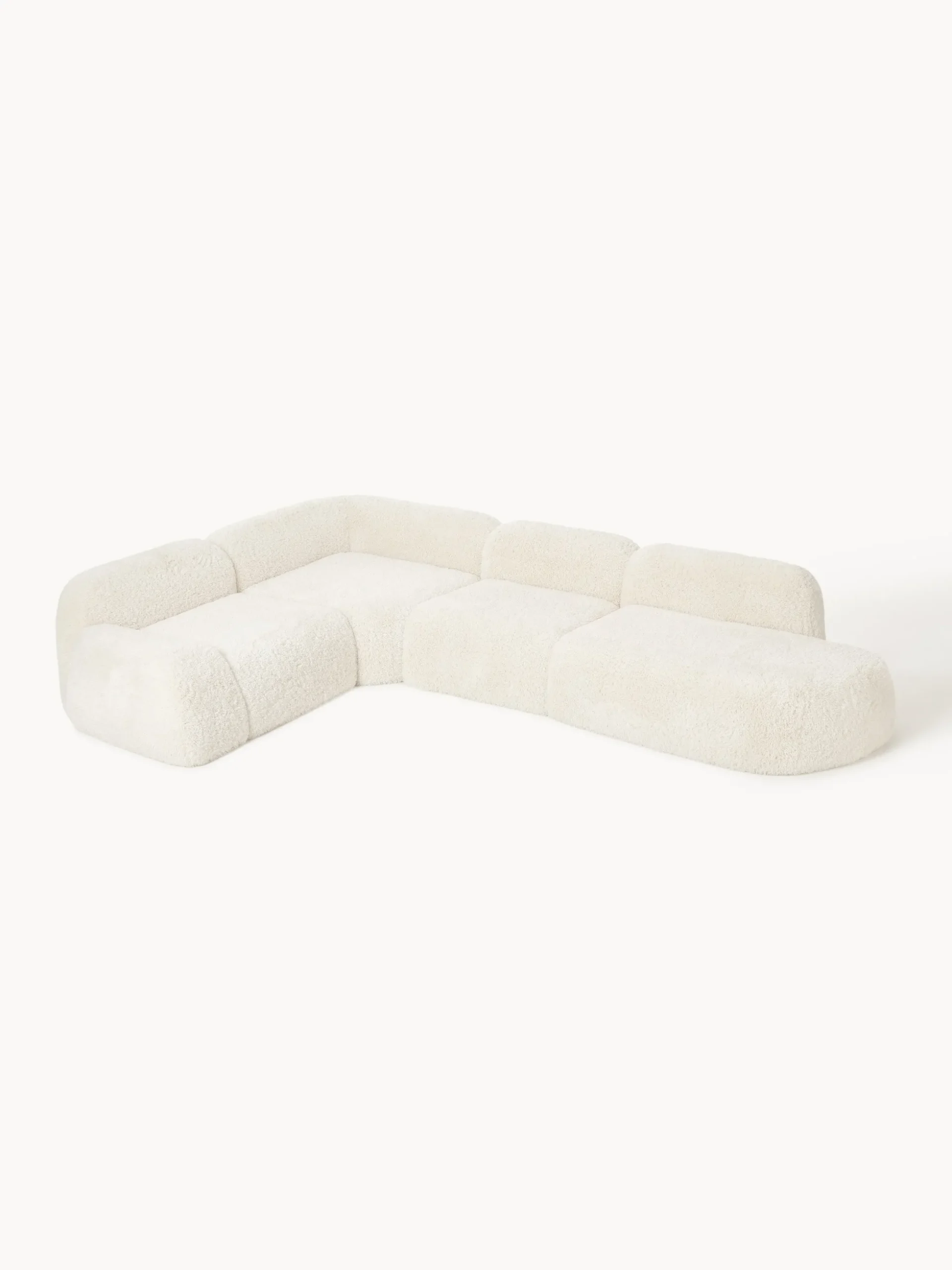 Divano angolare XL componibile 4 posti con chaise longue in teddy Wolke