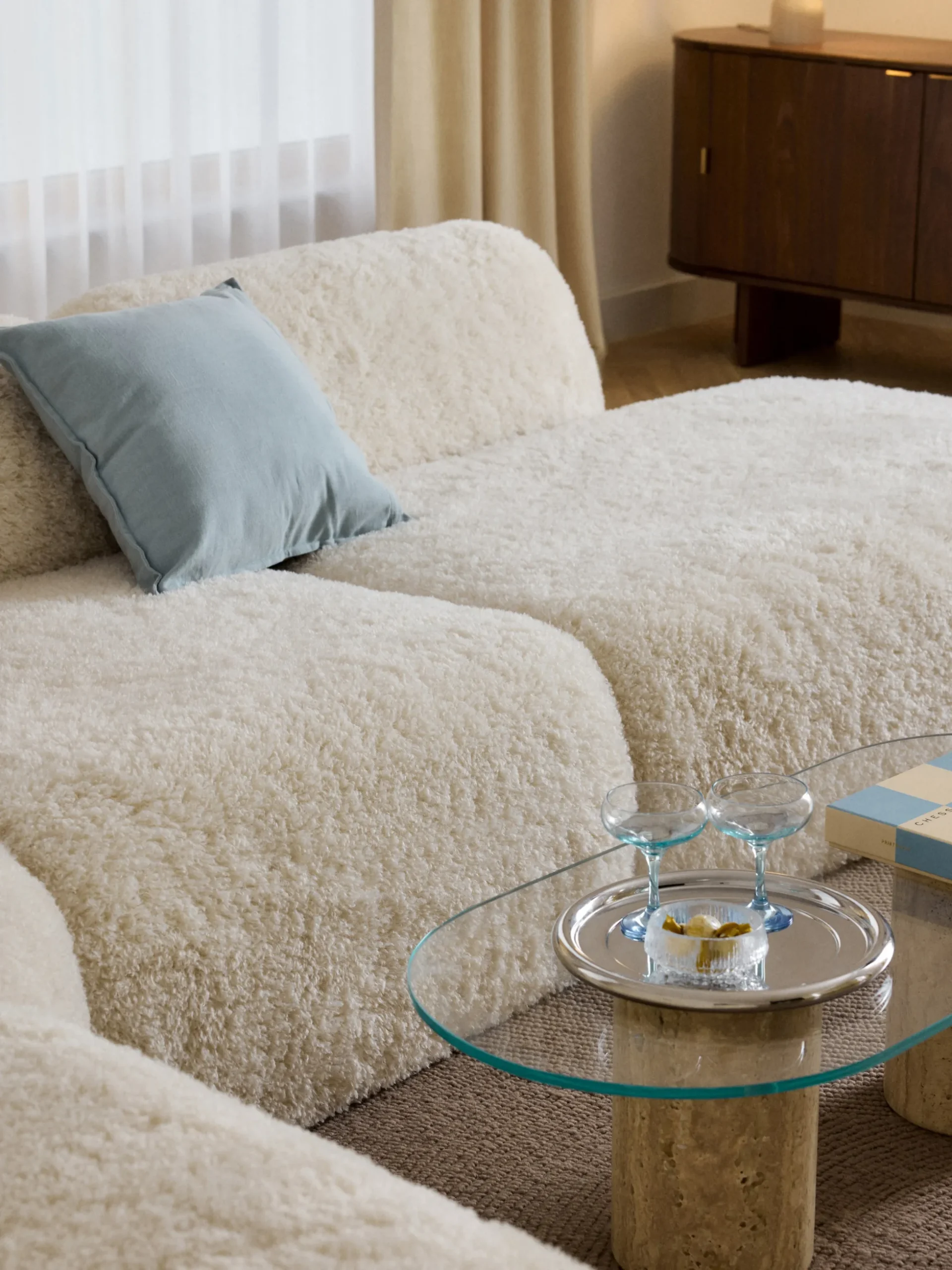 Divano angolare XL componibile 4 posti con chaise longue in teddy Wolke