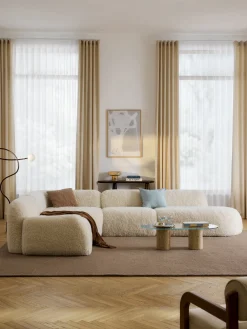 Divano angolare XL componibile 4 posti con chaise longue in teddy Wolke