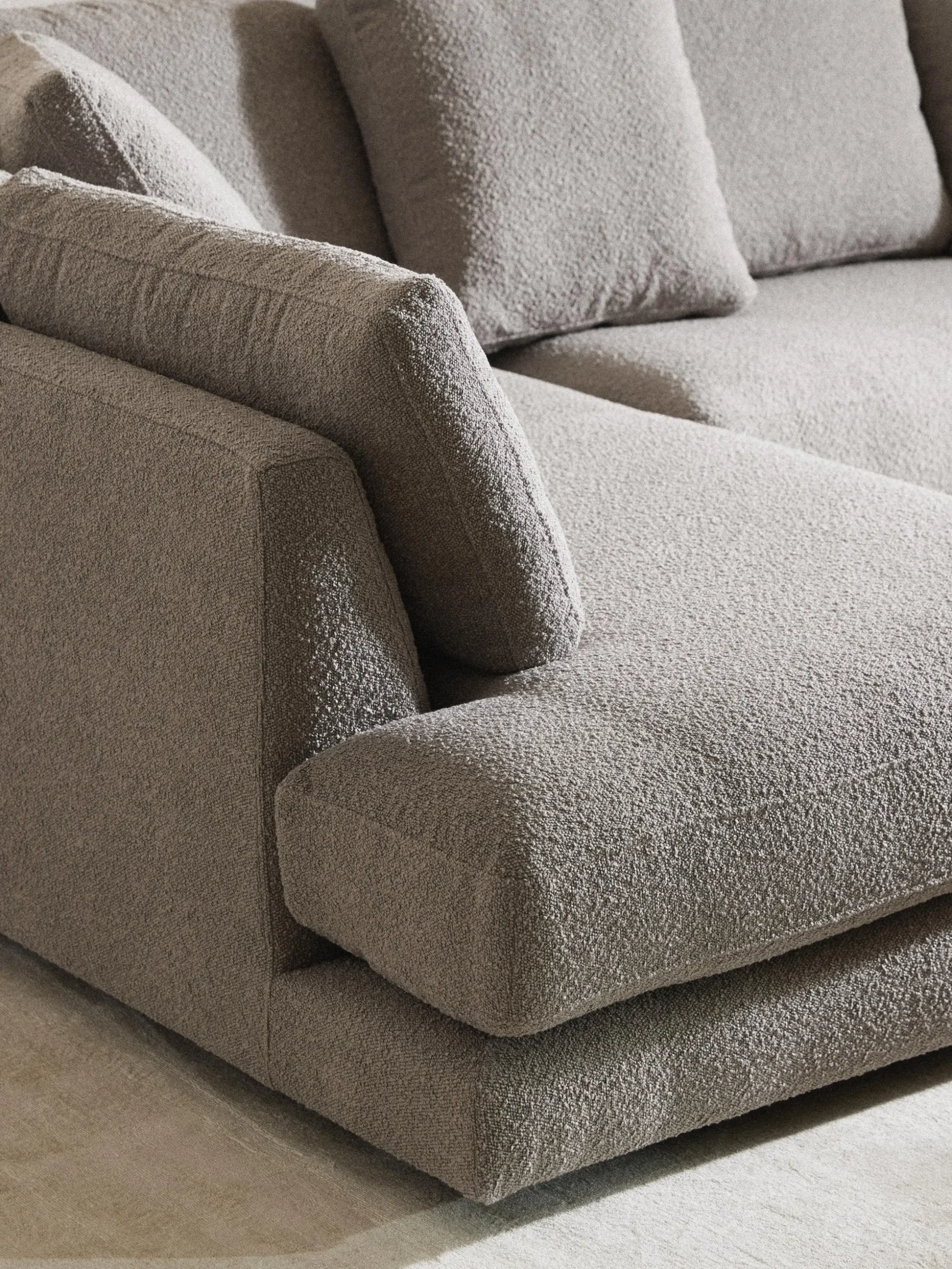 Divano angolare XL in bouclé Tribeca