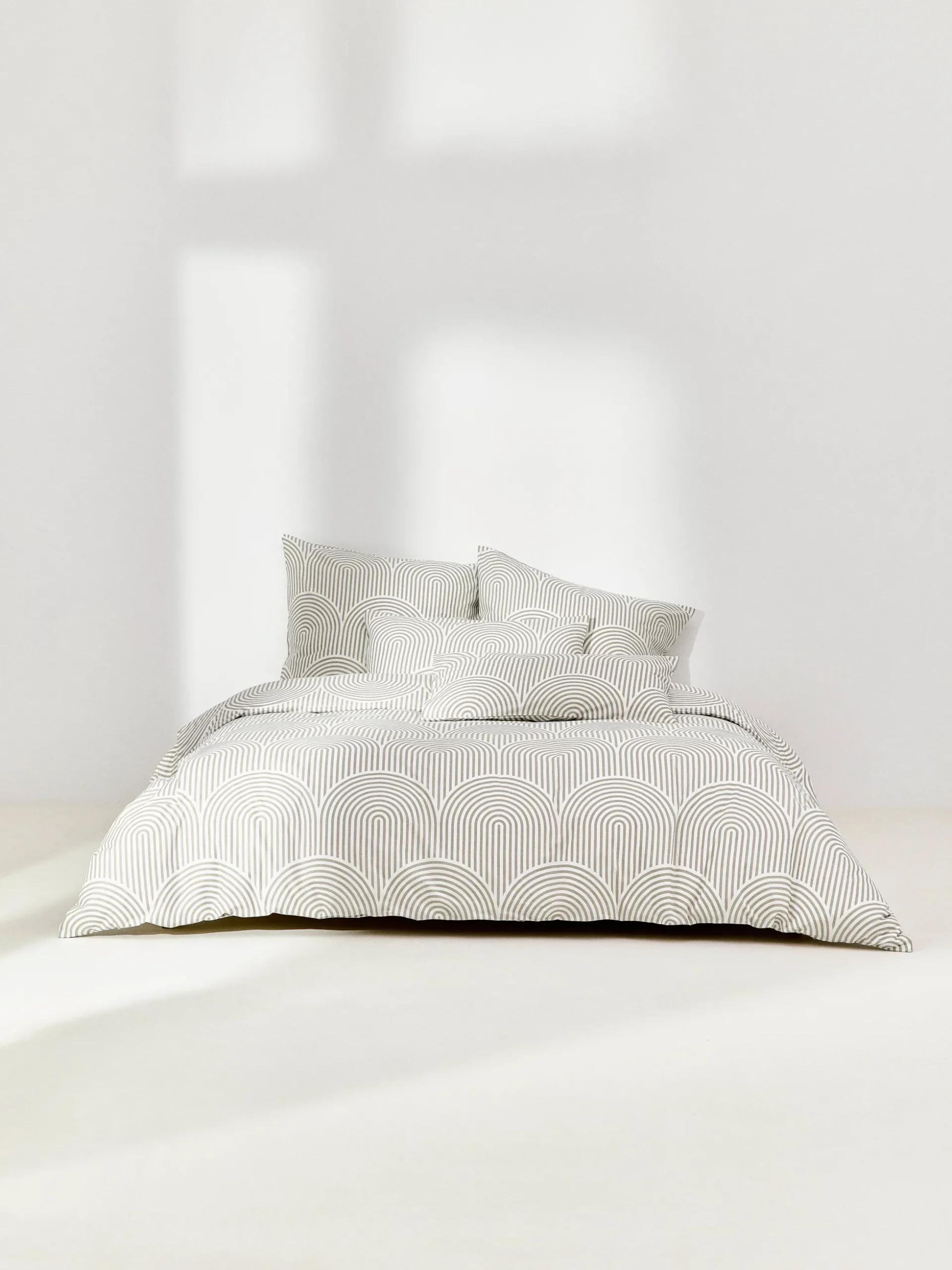 Federa in cotone con fantasia Arcs