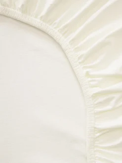Lenzuolo con angoli topper in jersey-elastan Lara